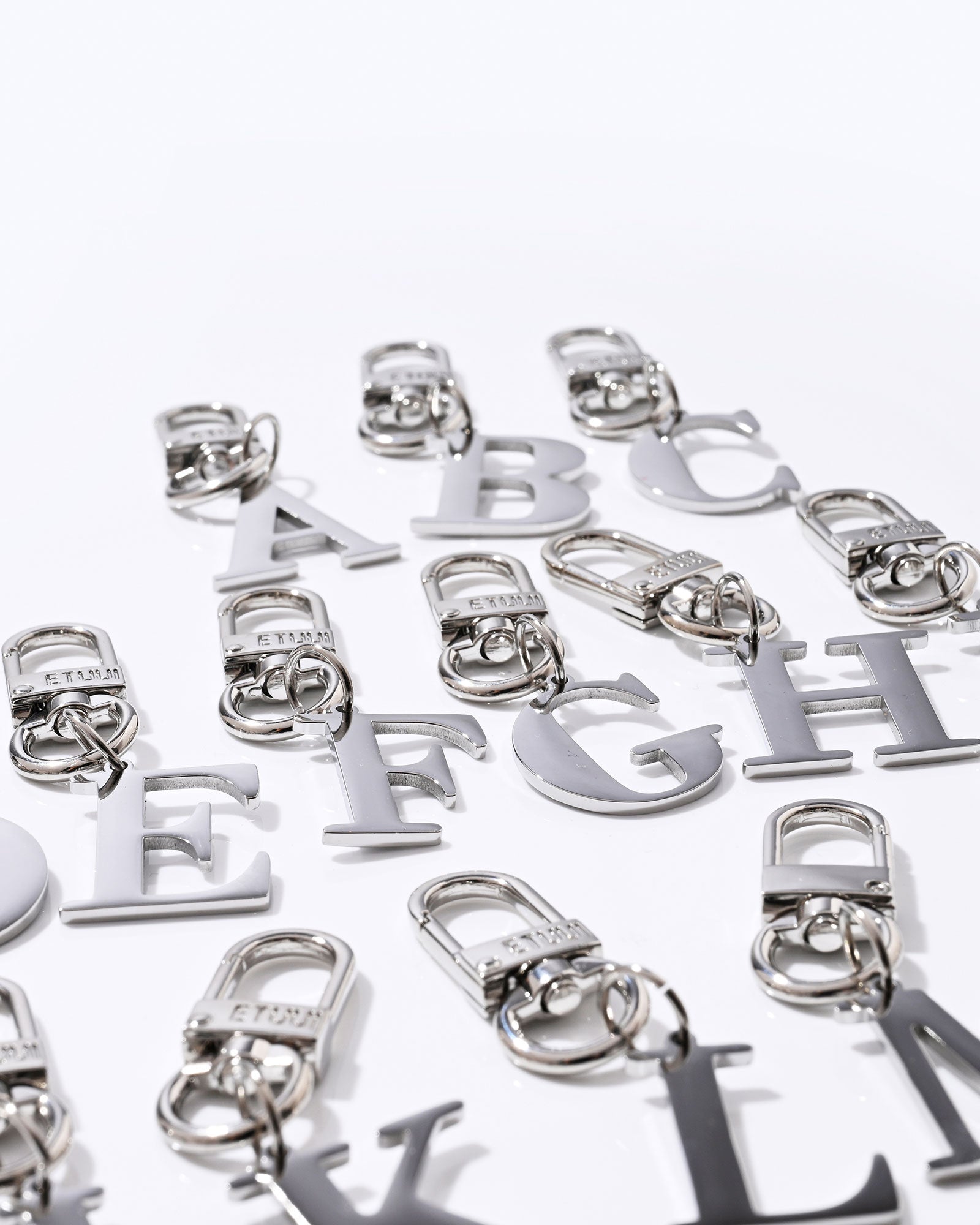 Silver letter charms
