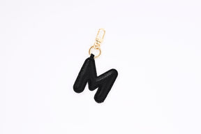Puffer Letter Charms Schwarz